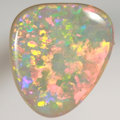 SOLID SEMI BLACK OPAL Quality opal. Very bright, red and orange rolling flashes over green and purple. With VIDEO